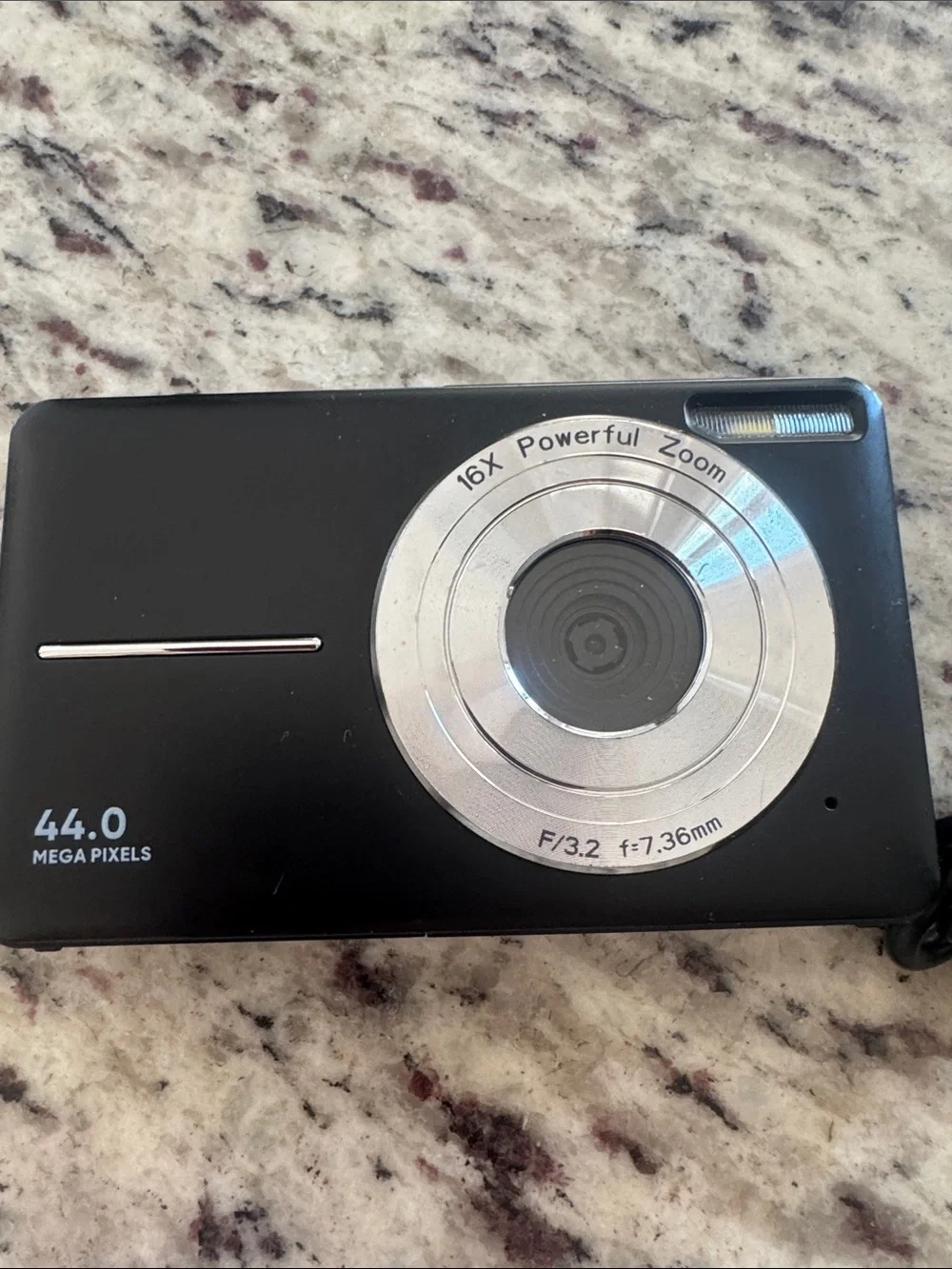 Compact Black Digital Point-and-Shoot Camera with USB Cable